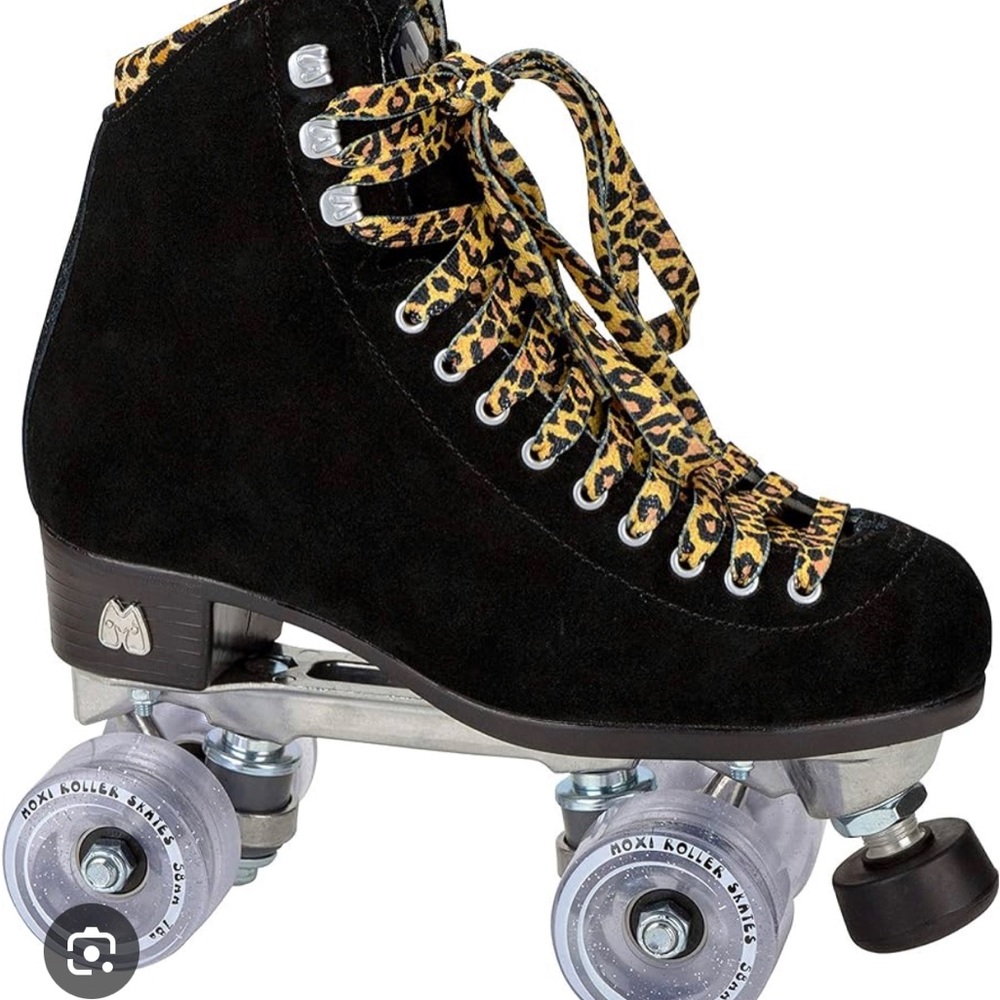 Moxi Panther Roller Skates. NIB. Black with leopard laces. Size 7